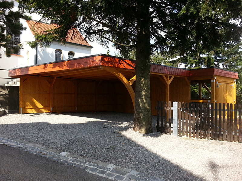 Doppelcarport Sonderkonstruktion aus Holz mit Rundbogen